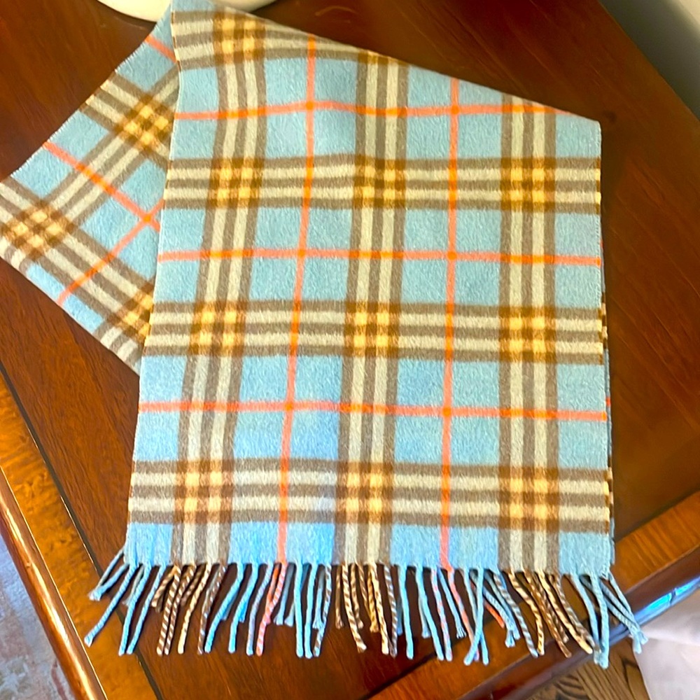Burberrys 100 cashmere light blue nova check plaid scarf.